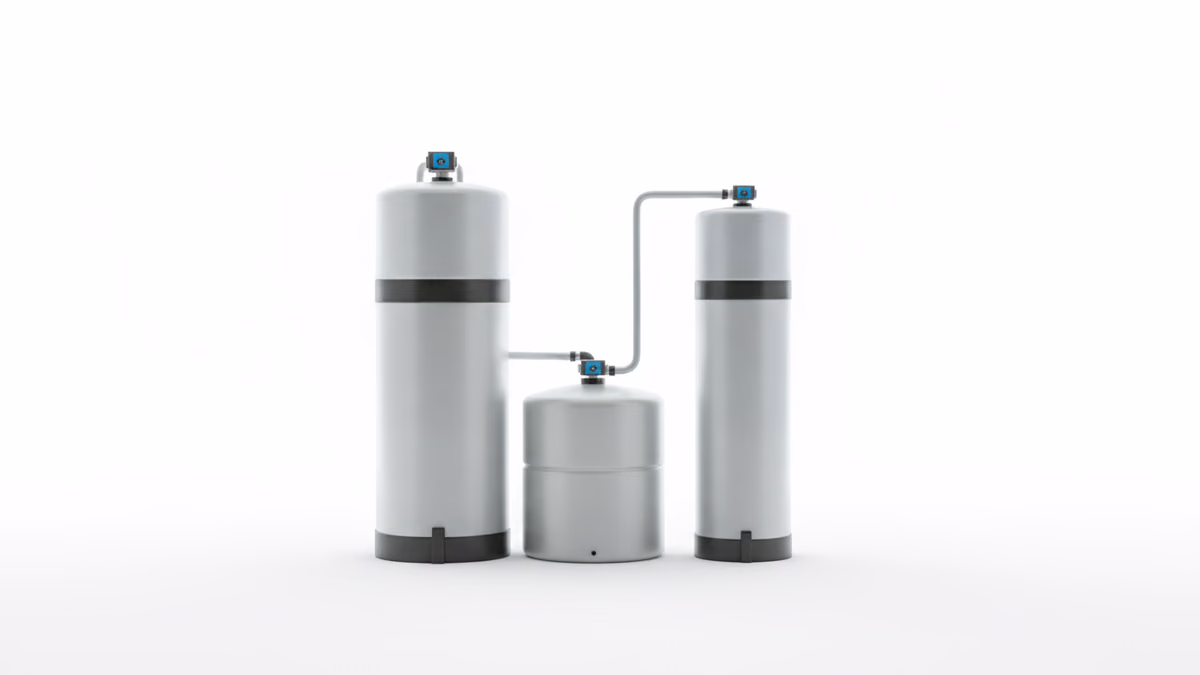 A salt-based water softener with brine tank and a salt-free conditioner tank staged side by side